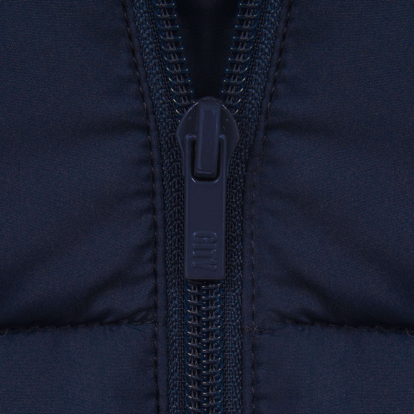Man City kids gilet in black with full colour club crest to chest.