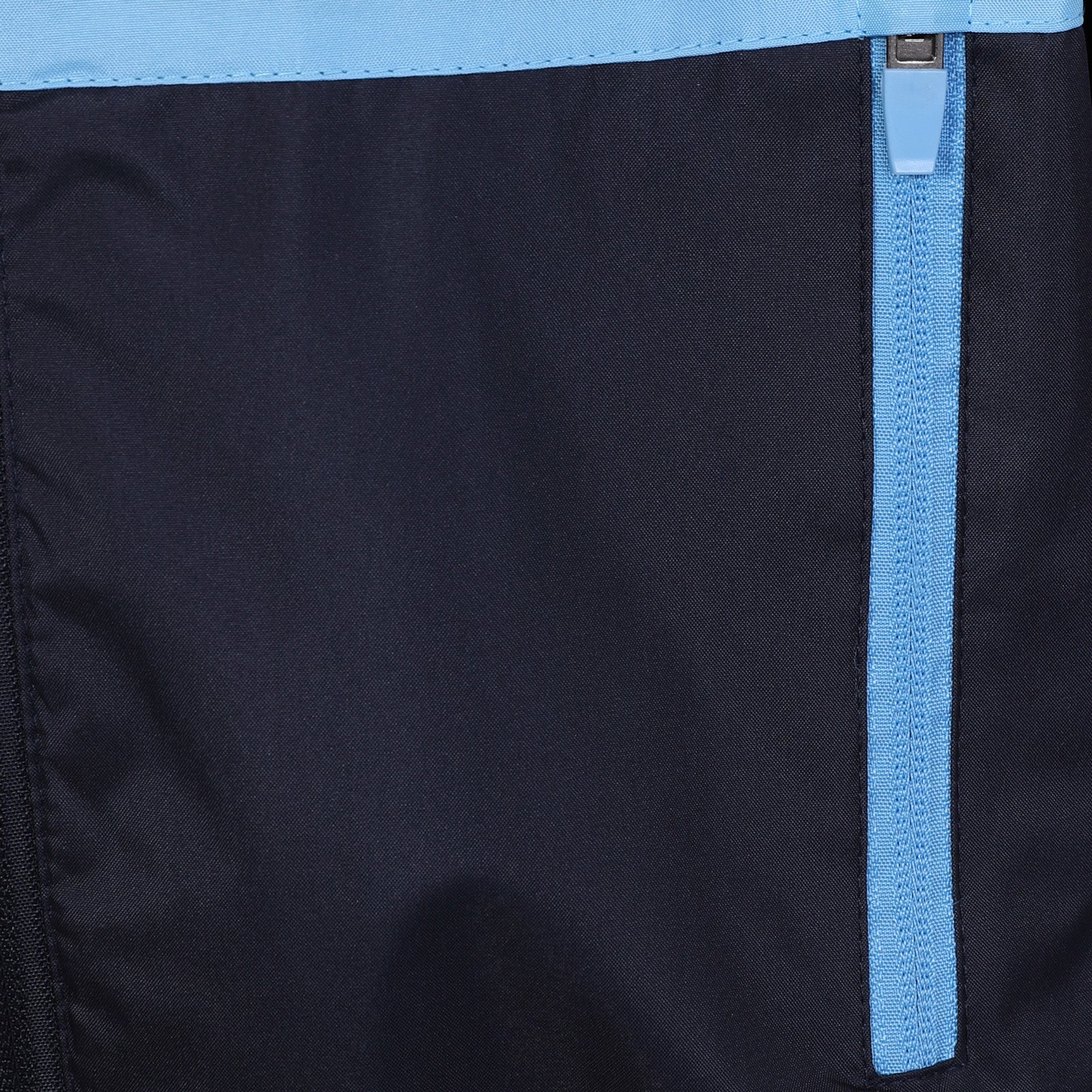 Man City adults shower jacket in navy & sky blue with club crest to chest.