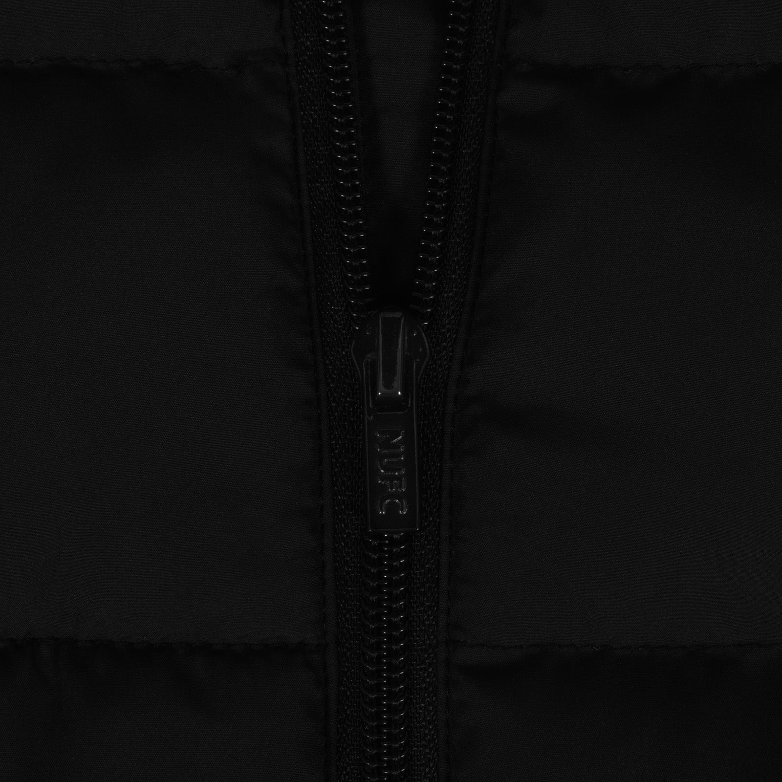 Newcastle Utd kids gilet in black with full colour club crest to chest.