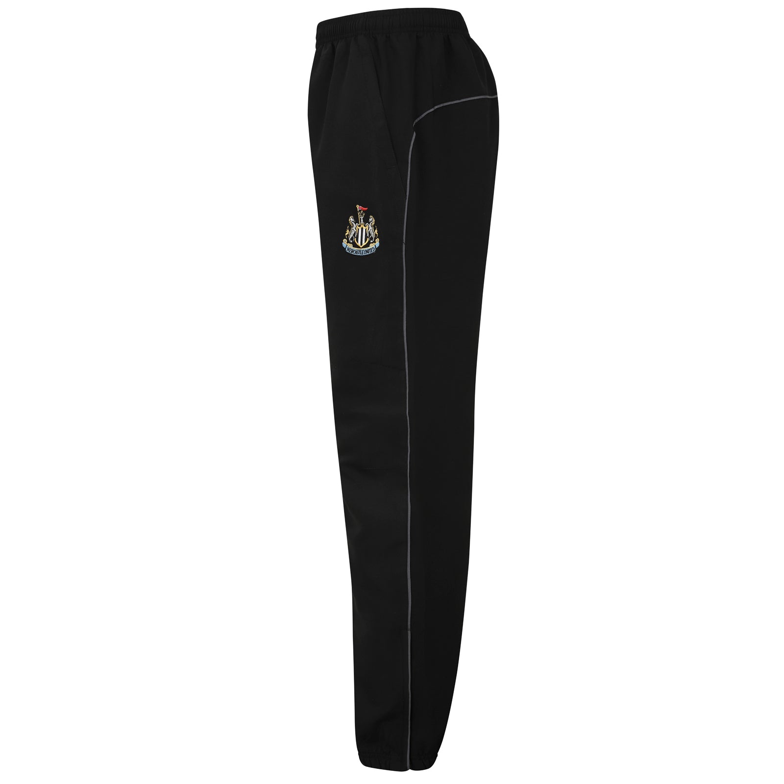 Newcastle Utd kids tracksuit in black with club crest to chest and left thigh