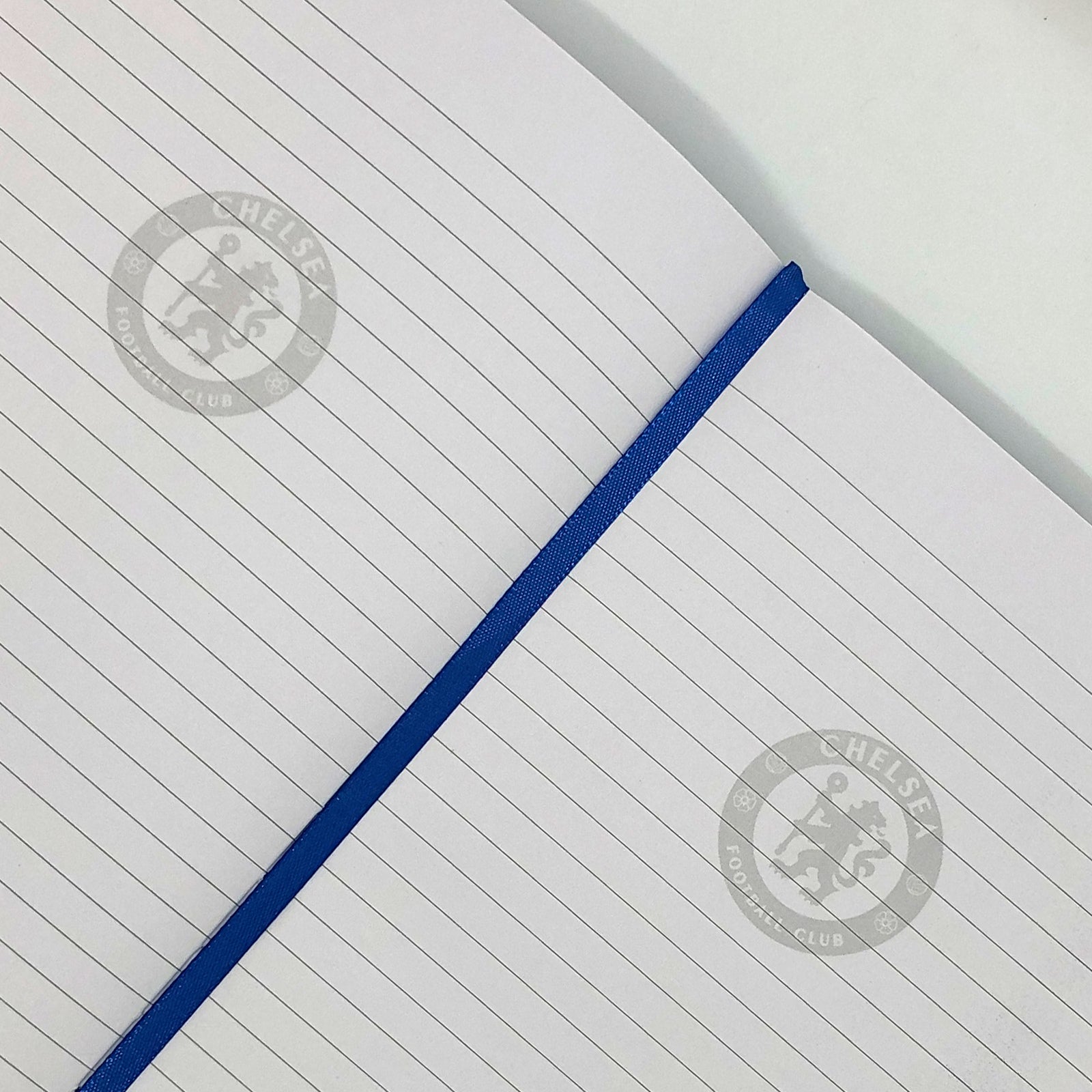 Chelsea notebook & pen in black with silver foil crest in club design gift box.