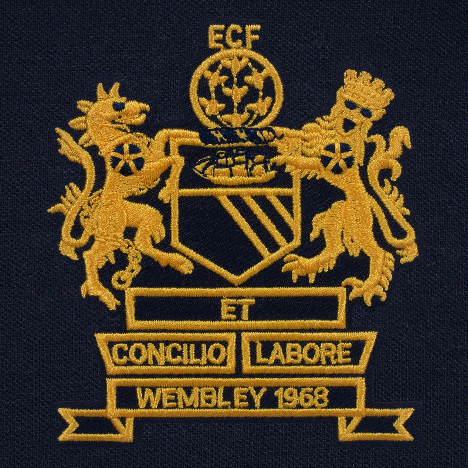 United retro polo shirt in navy with 1968 Wembley crest