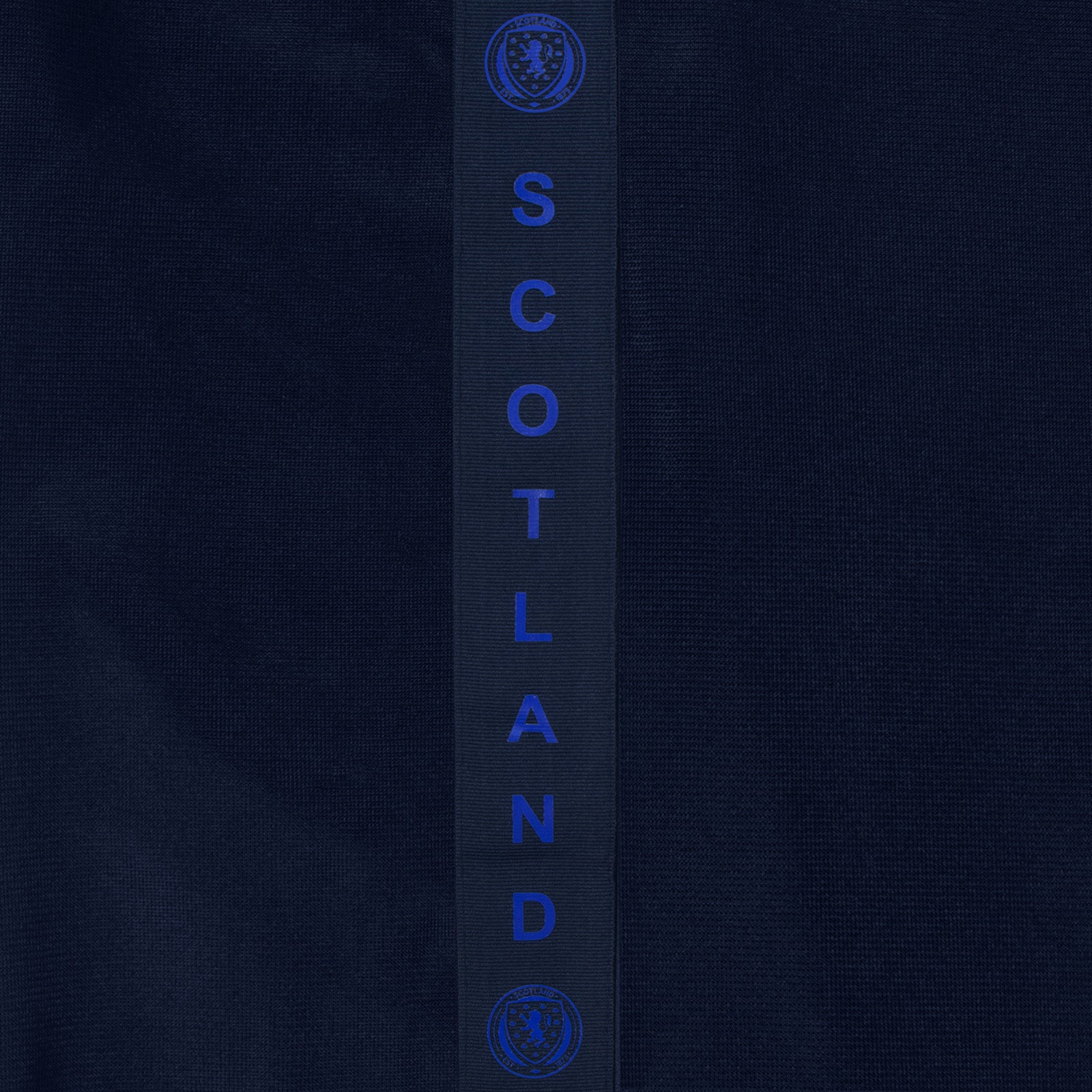 Scotland kids taped tracksuit in navy blue with SFA team crest and text to both top & pants