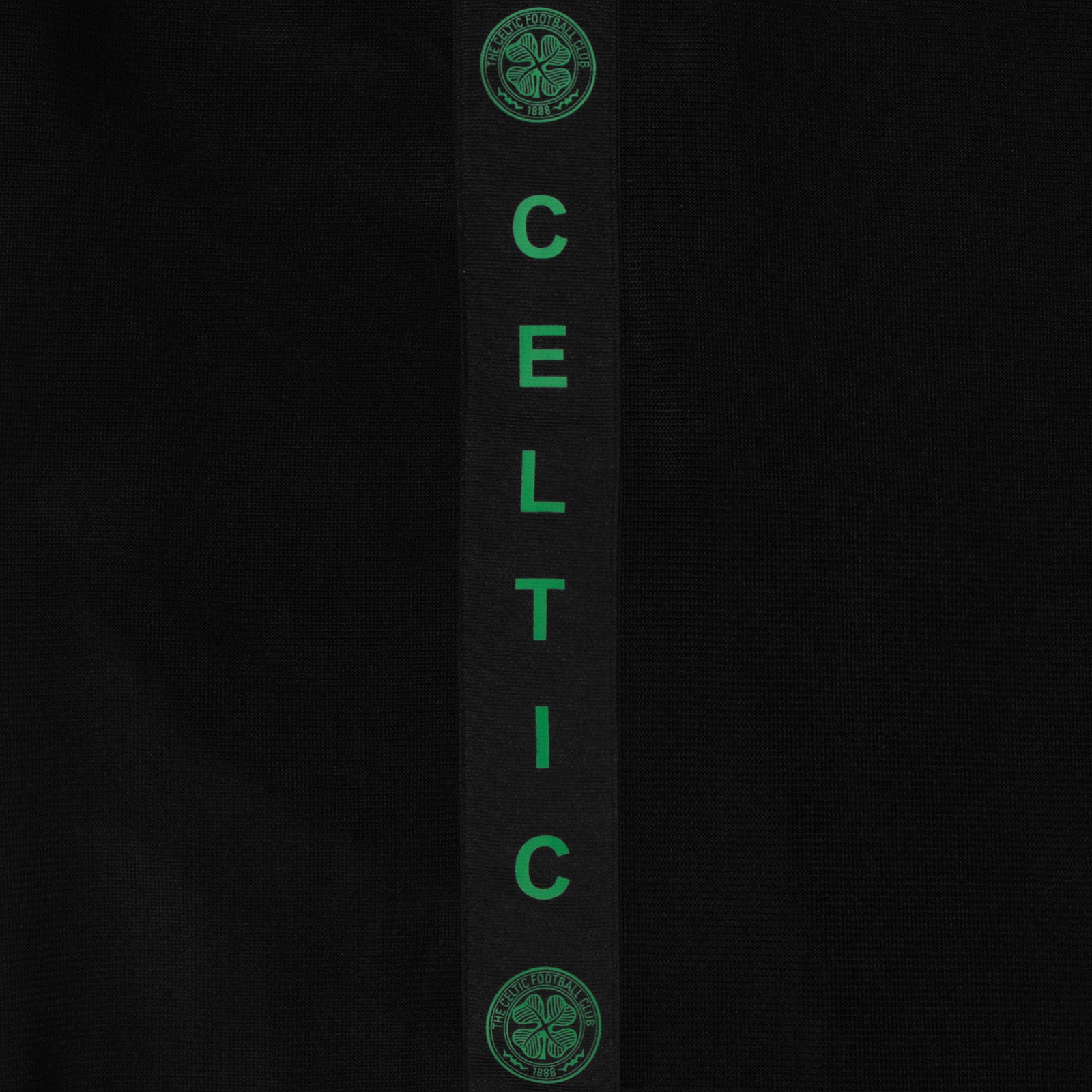 Celtic kids taped tracksuit in black with club crest and text to both top & pants