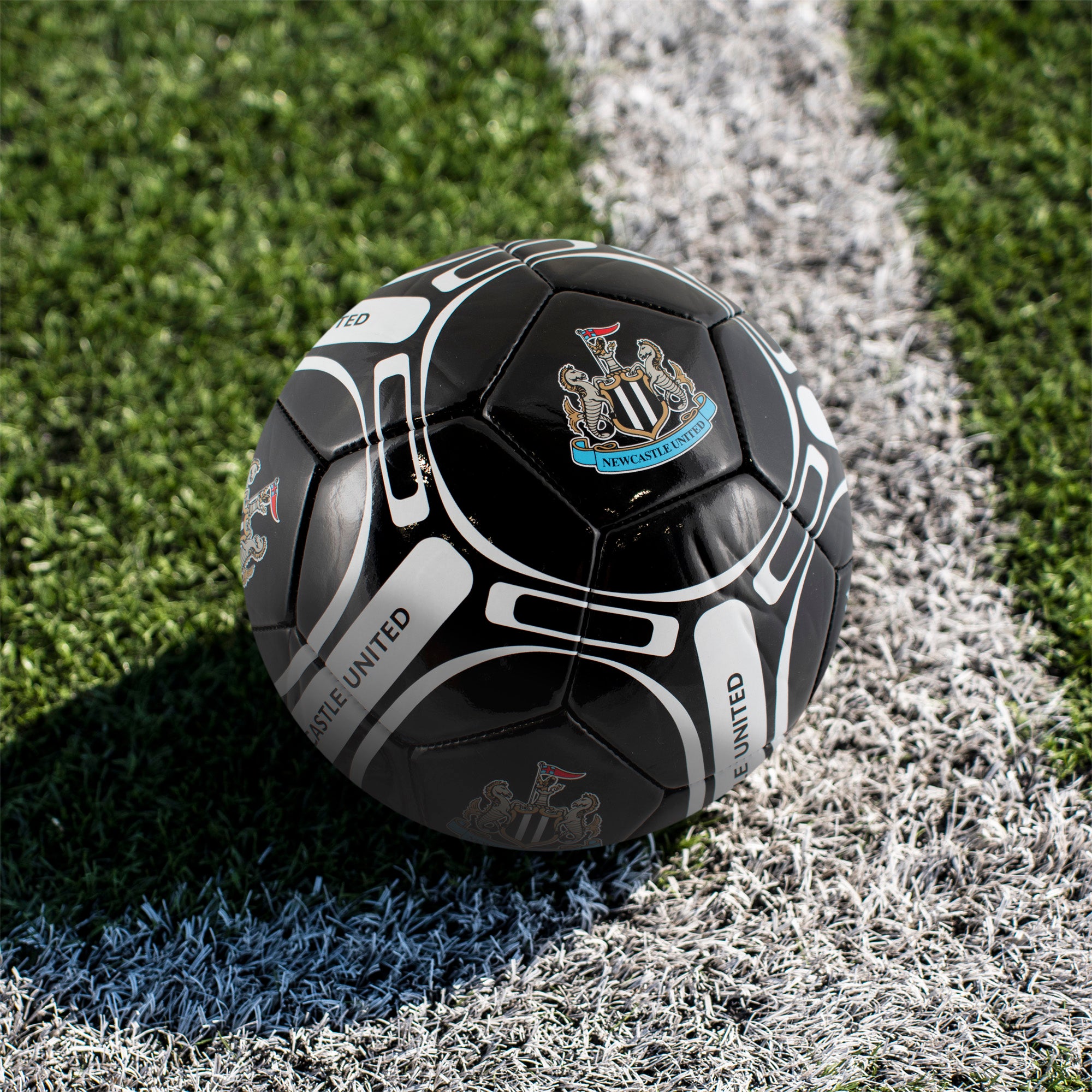 Newcastle United size 4 football in black with club crests & text