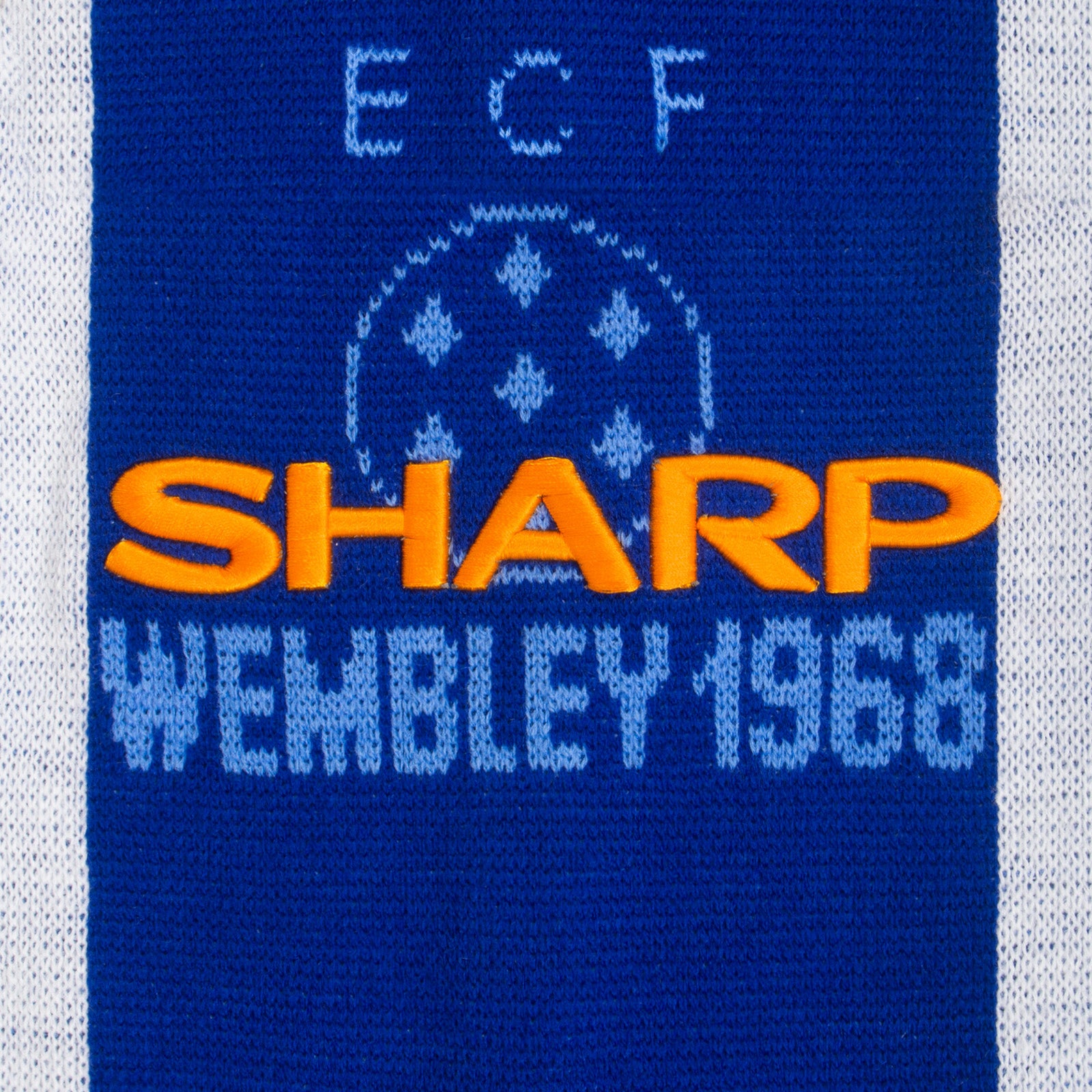 Man United bobble hat in retro blue 1996 colours