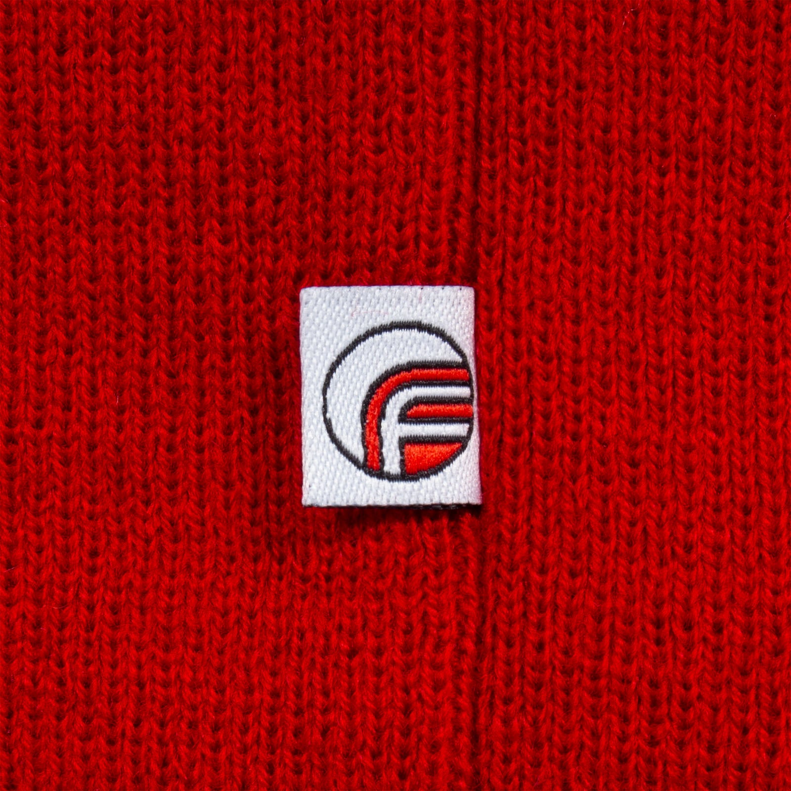 Man United knitted bobble hat in red with text to front
